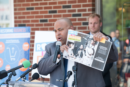 Mayor of Lawrence speaking at a conference