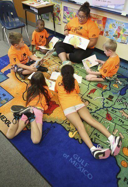 kids in a reading circle