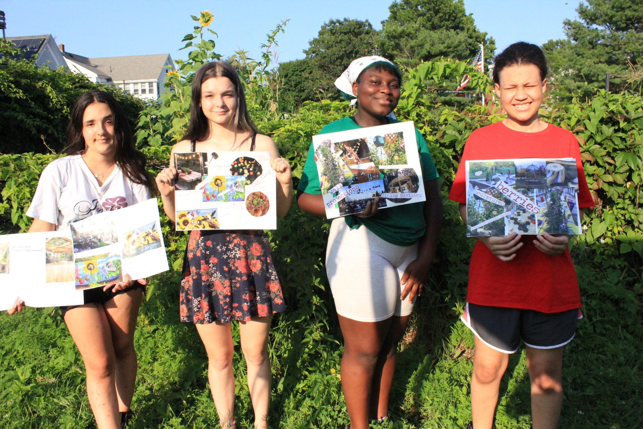 Young people create art that depicts how they visualize agriCulture, the new community gathering spot that will be completed this fall at Willowood Gardens in Gloucester.